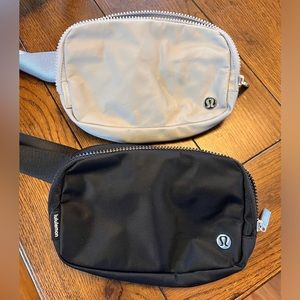 Set of Lululemon 1L belt bags. Light Gray and Black.